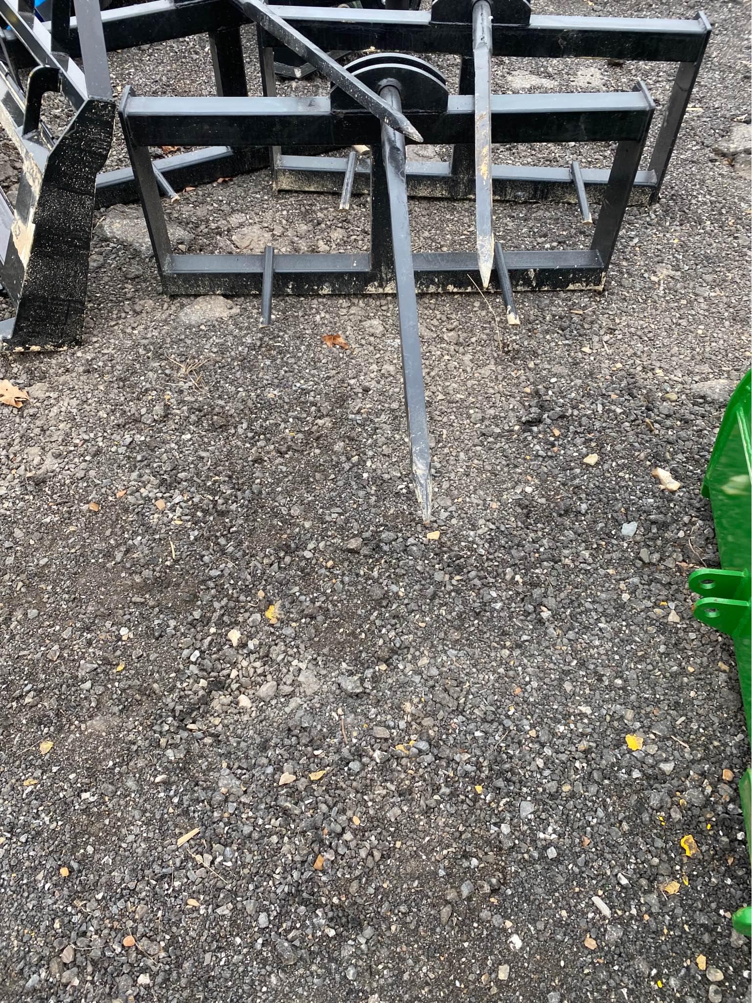 New Midstates skid steer bale spike. Good thick steel rated at 2200 lbs