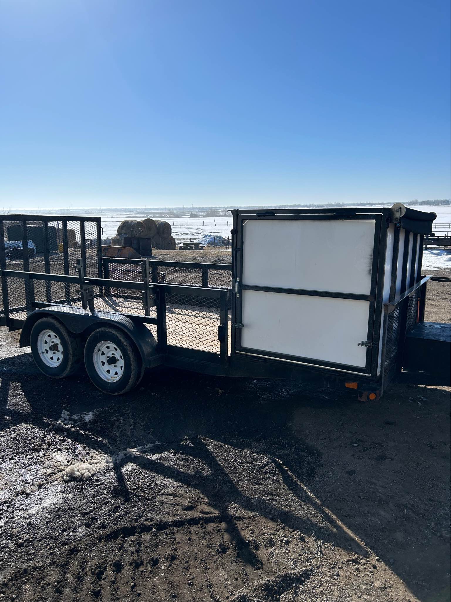 FOT landscaping trailer with a 2yd grass hydraulic dumping box with